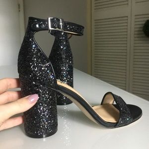 Katy Perry sparkly black block heels.